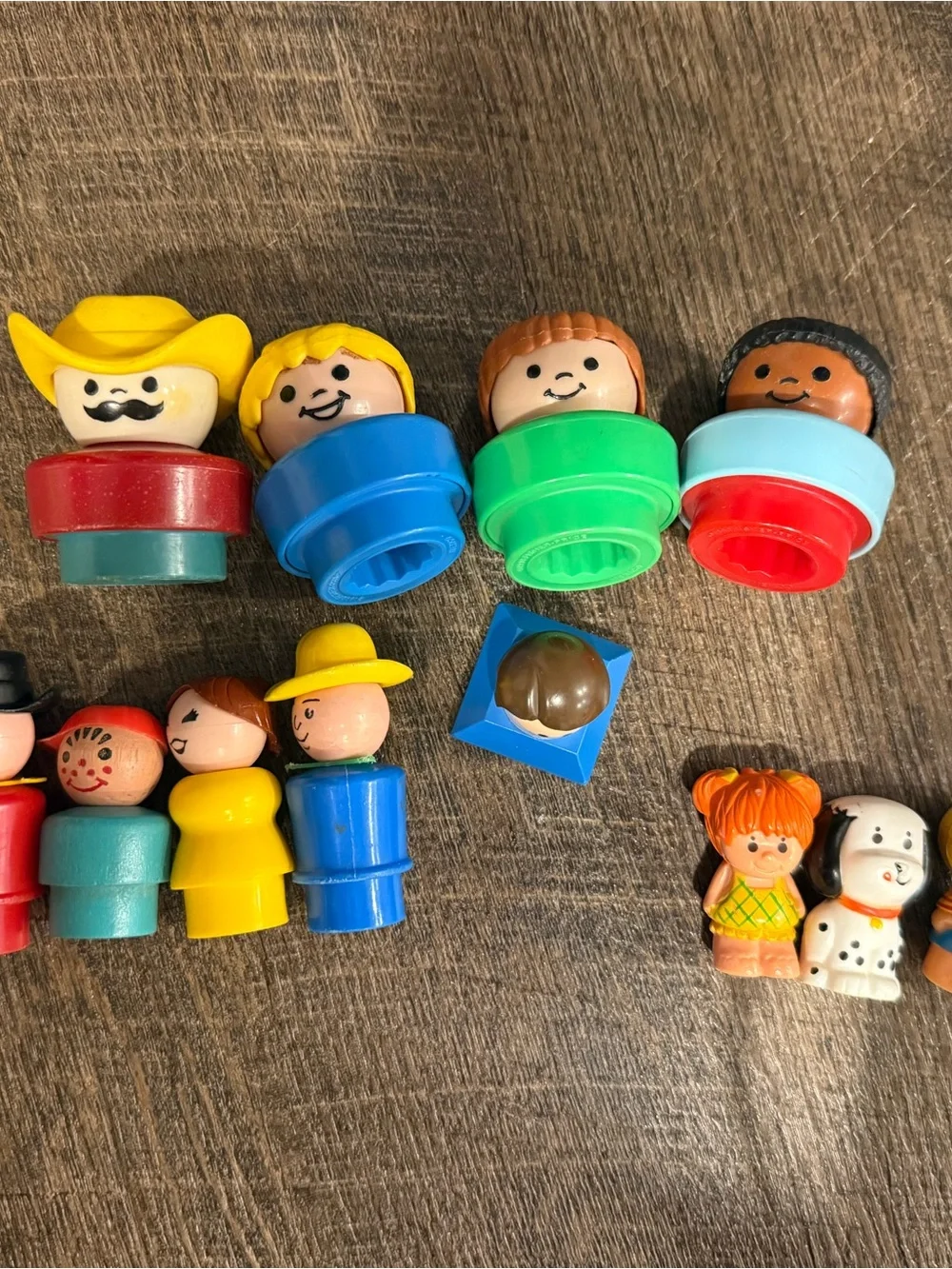 Fisher-Price Peg People Set with Bright Yellow, Blue, Green, Red, Brown